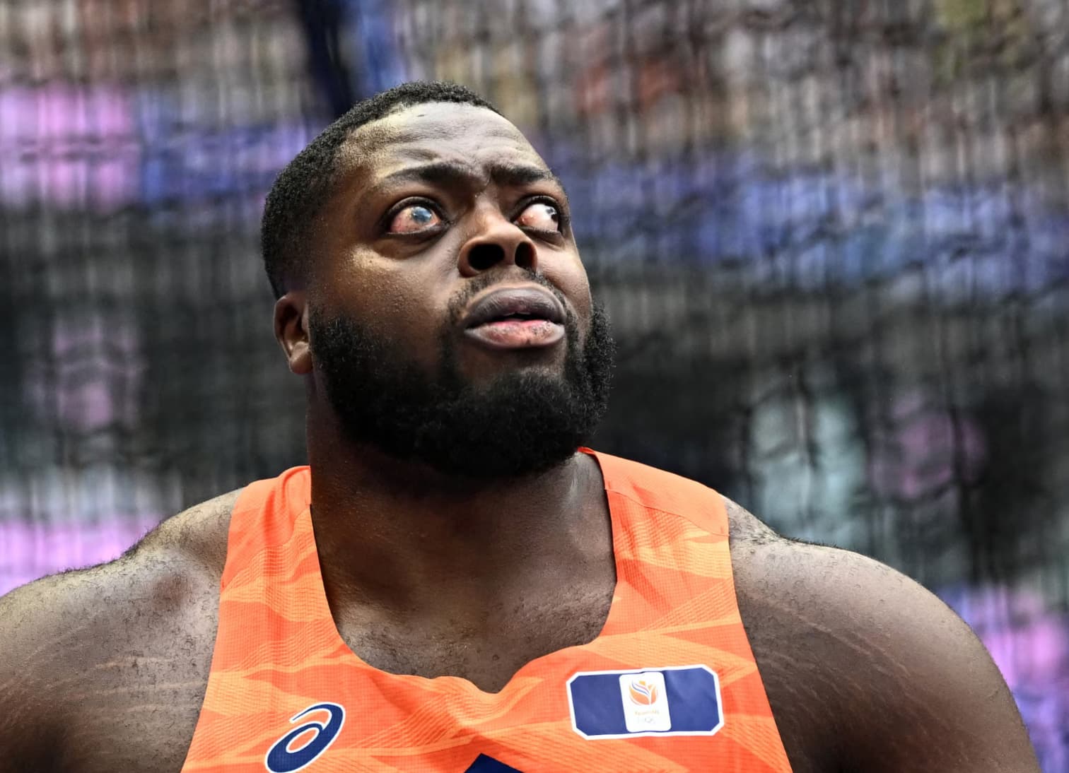 Dutch hammer thrower Denzel Comenentia moments after completing his turn. 